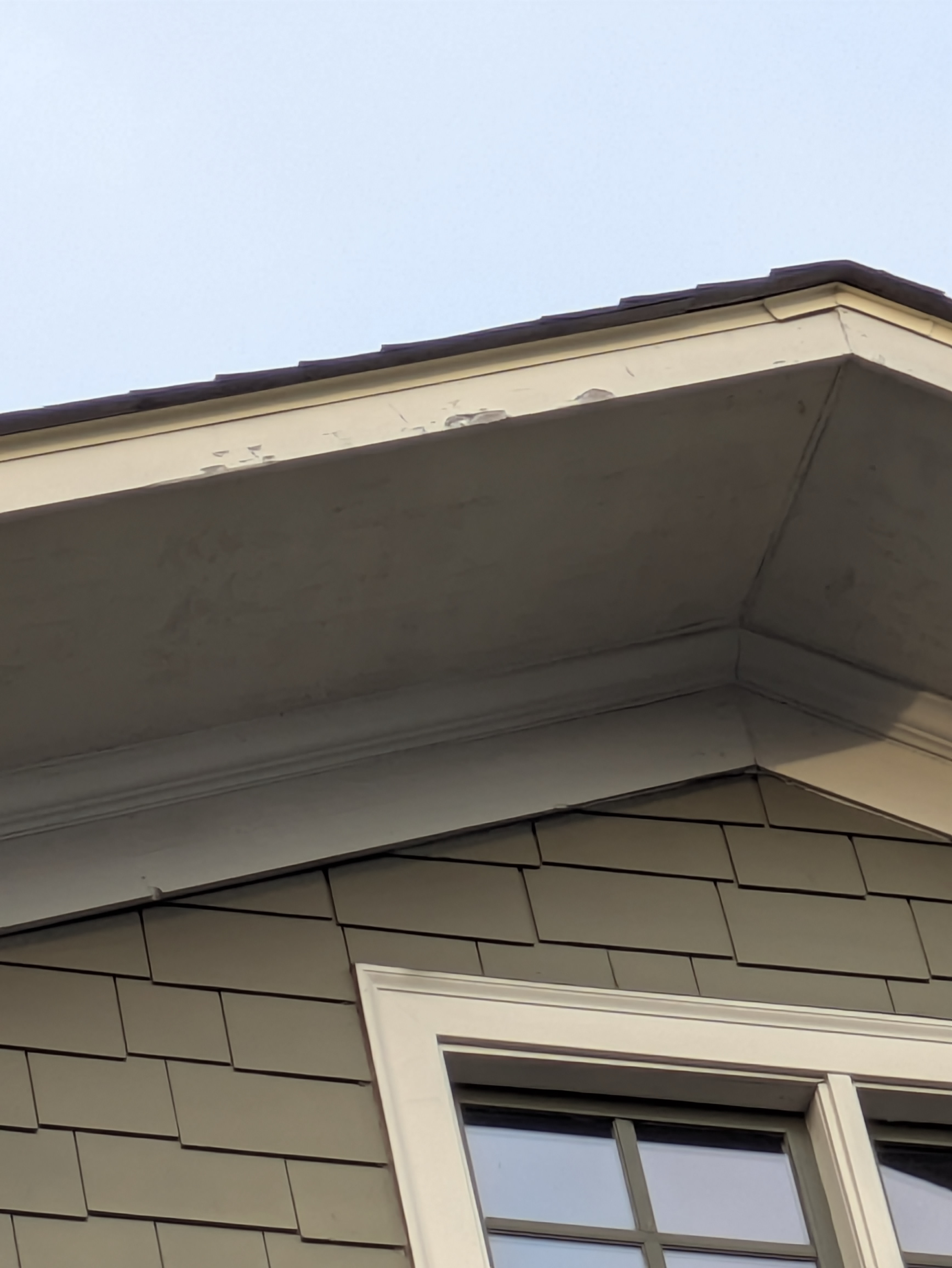 New white trim around a window in a Normaltown remodel